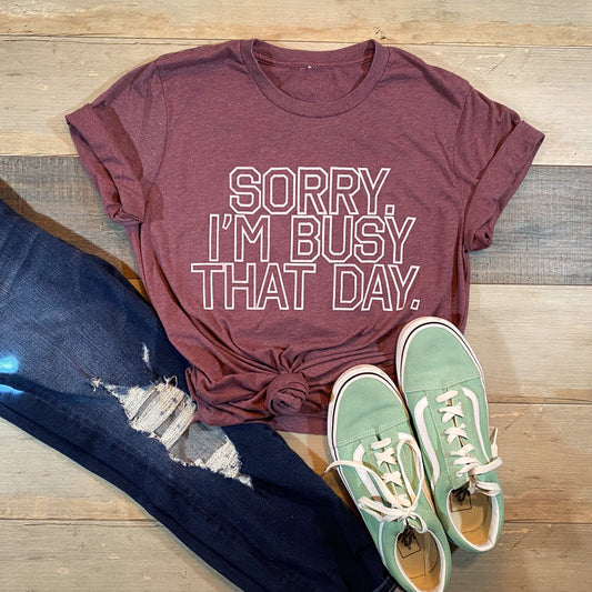 I’m busy that day. [ screen-printed t-shirt ]