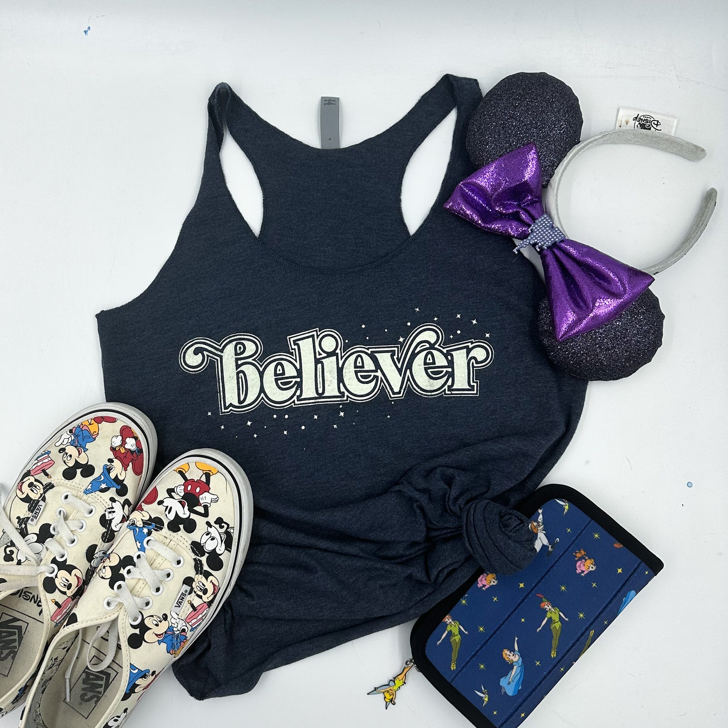 believer | women's racerback tank